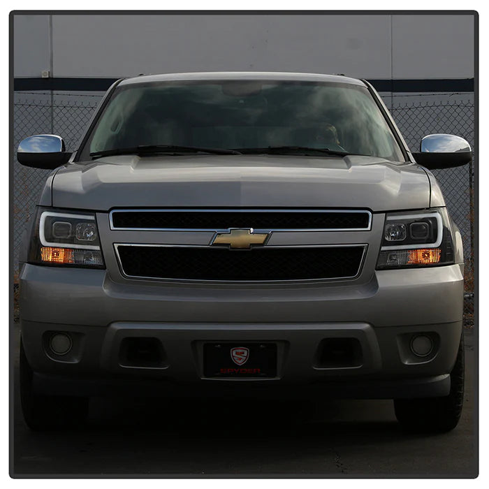 2007-2014 Chevy Suburban 1500/2500 / 2007-2014 Chevy Tahoe / 2007-2014 Avalanche Version 2 Projector Headlights - High H1 (Included) - Low H7 (Included) Light Bar DRL - Black