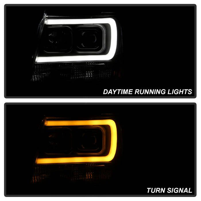 2007-2014 Chevy Suburban 1500/2500 / 2007-2014 Chevy Tahoe / 2007-2014 Avalanche Version 2 Projector Headlights - High H1 (Included) - Switch Back Turn Signal Light Bar - Low H7 (Included)  Signal-LED (Included) - Black