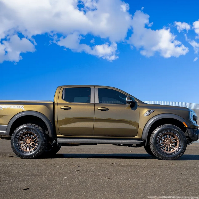 18x9.0 Arena Hustle Smoked Bronze Center Satin Black Lip