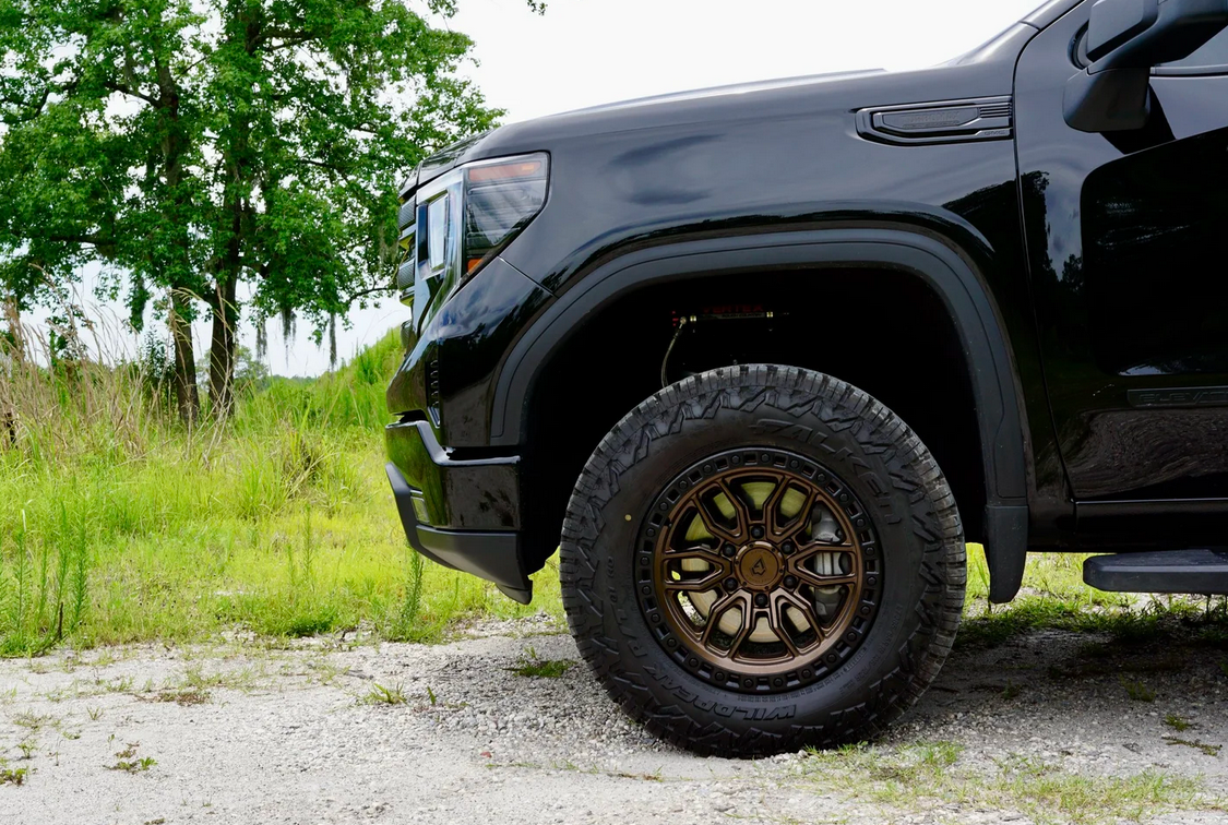 18x9.0 Arena Hustle Smoked Bronze Center Satin Black Lip