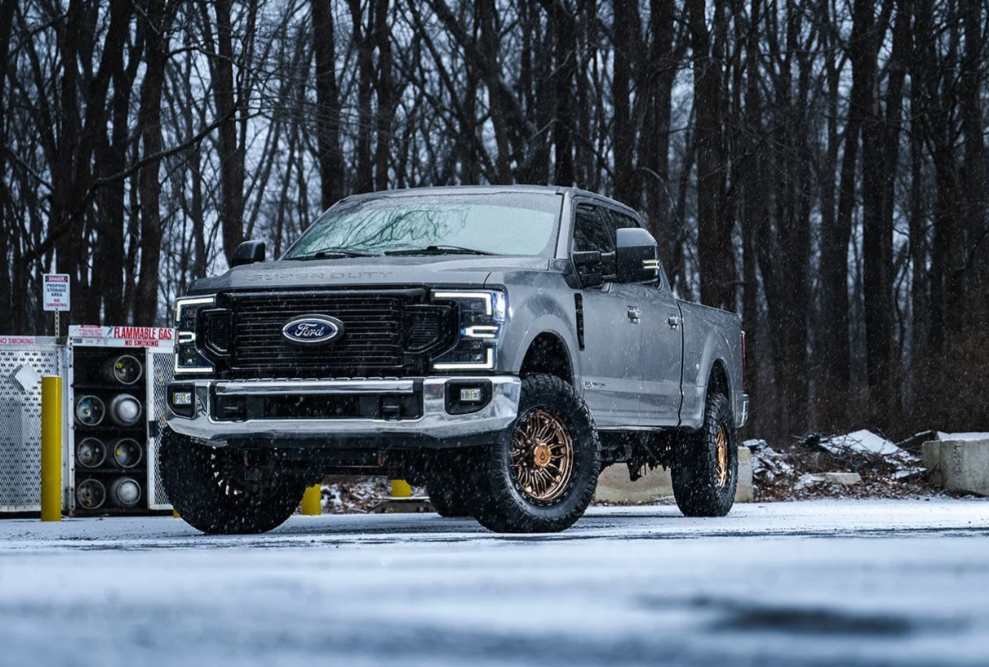 20x9.0 Arena Hustle Smoked Bronze Center Satin Black Lip