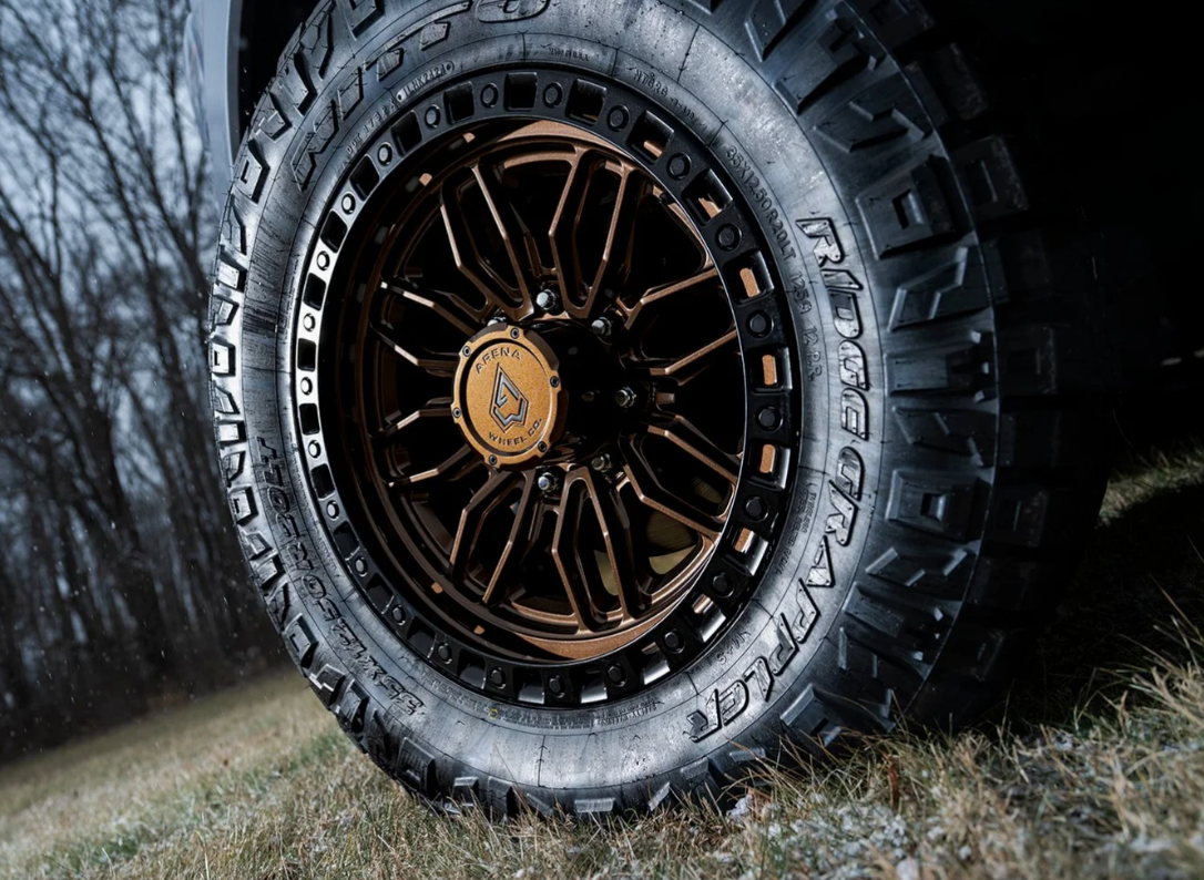 20x9.0 Arena Hustle Smoked Bronze Center Satin Black Lip