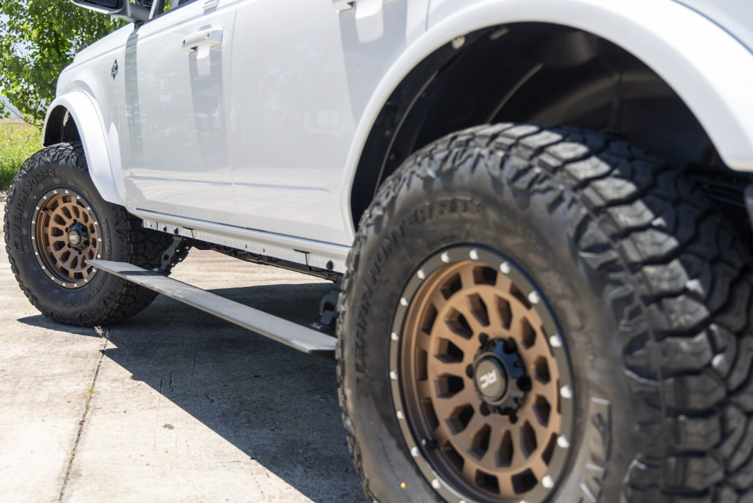17x8.5 Rough Country 87 Series Wheel Bronze/Black