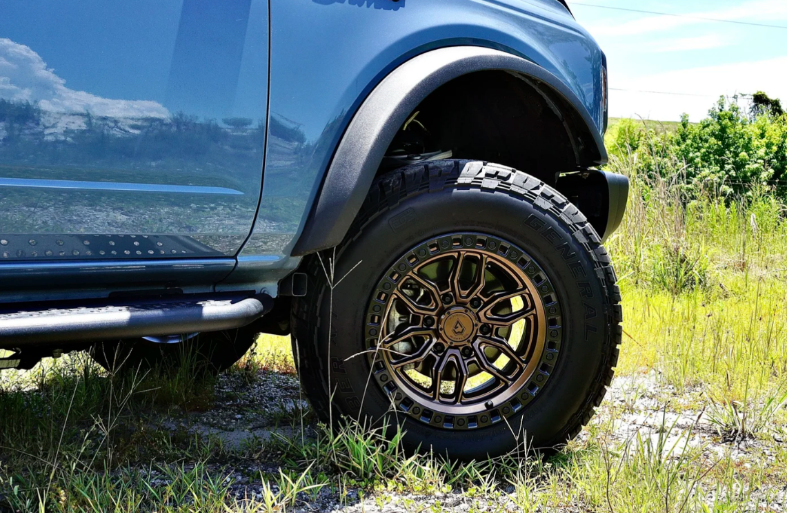20x9.0 Arena Hustle Smoked Bronze Center Satin Black Lip