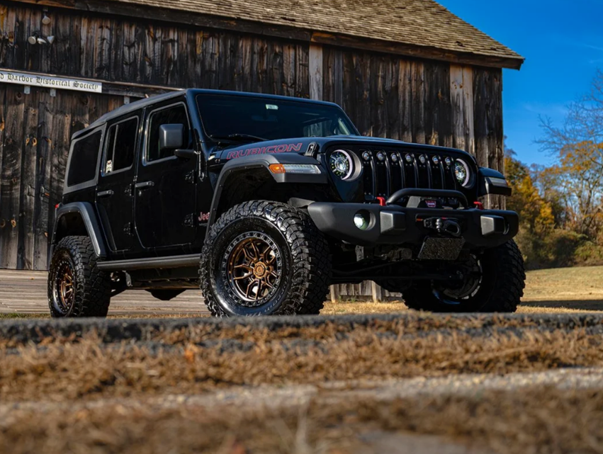20x9.0 Arena Hustle Smoked Bronze Center Satin Black Lip