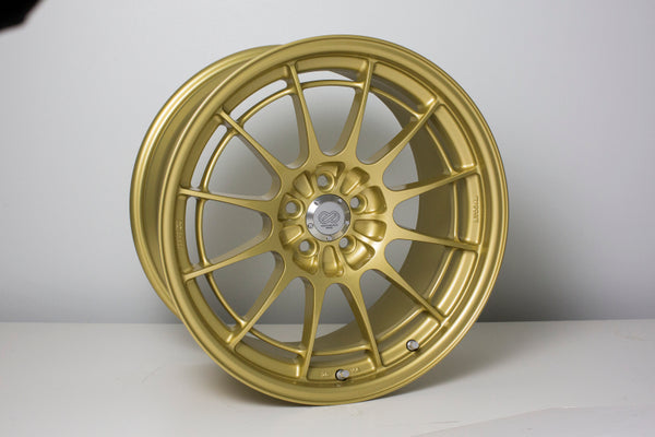 18x9.5 Enkei NT03+M, 5x100 40mm Offset Gold Wheel