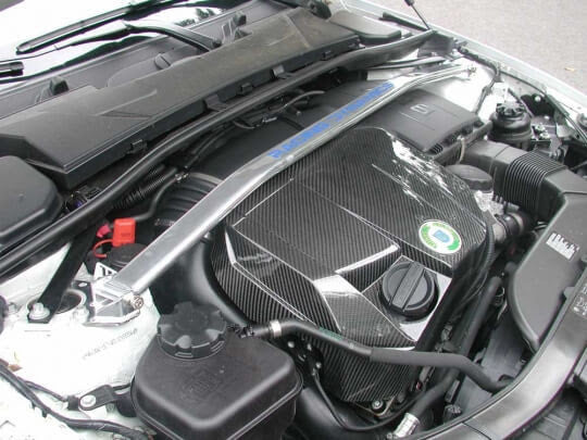 Racing Dynamics Carbon Fiber Engine Cover for BMW models with N55 motors including BMW 135i, X1, 335i, 335xi & 535i/xi